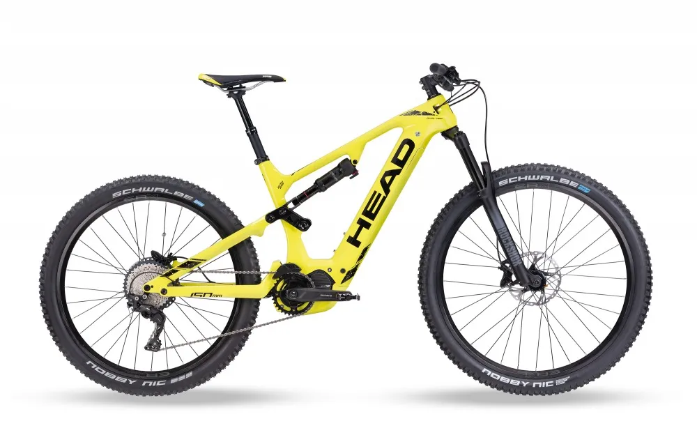 Yellow Muret II EP8 carbon e-mountain bike, side view. RockShox suspension, Mullet Wheels and Shimano brakes visible.