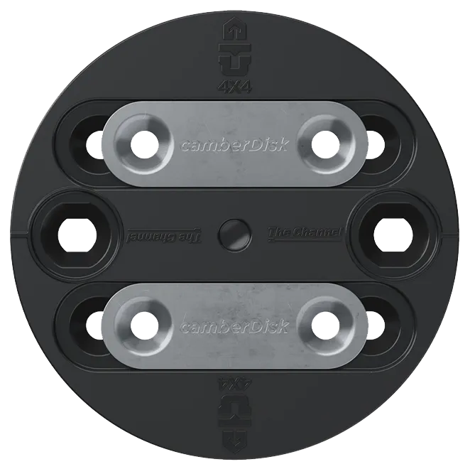 Close-up of the black Union Atlas Pro camber disk with silver washers and mounting holes.