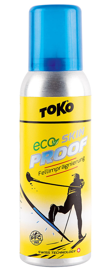 Gelbe Sprühflasche Toko Eco Skin Proof mit blauem Deckel und Grafik eines Langläufers.