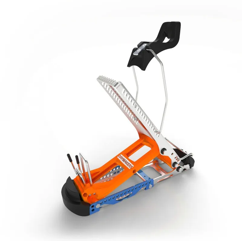 Vue détaillée de l'adaptateur de ski Daymaker Touring Classic, montrant la base orange et la cale de montée argentée.