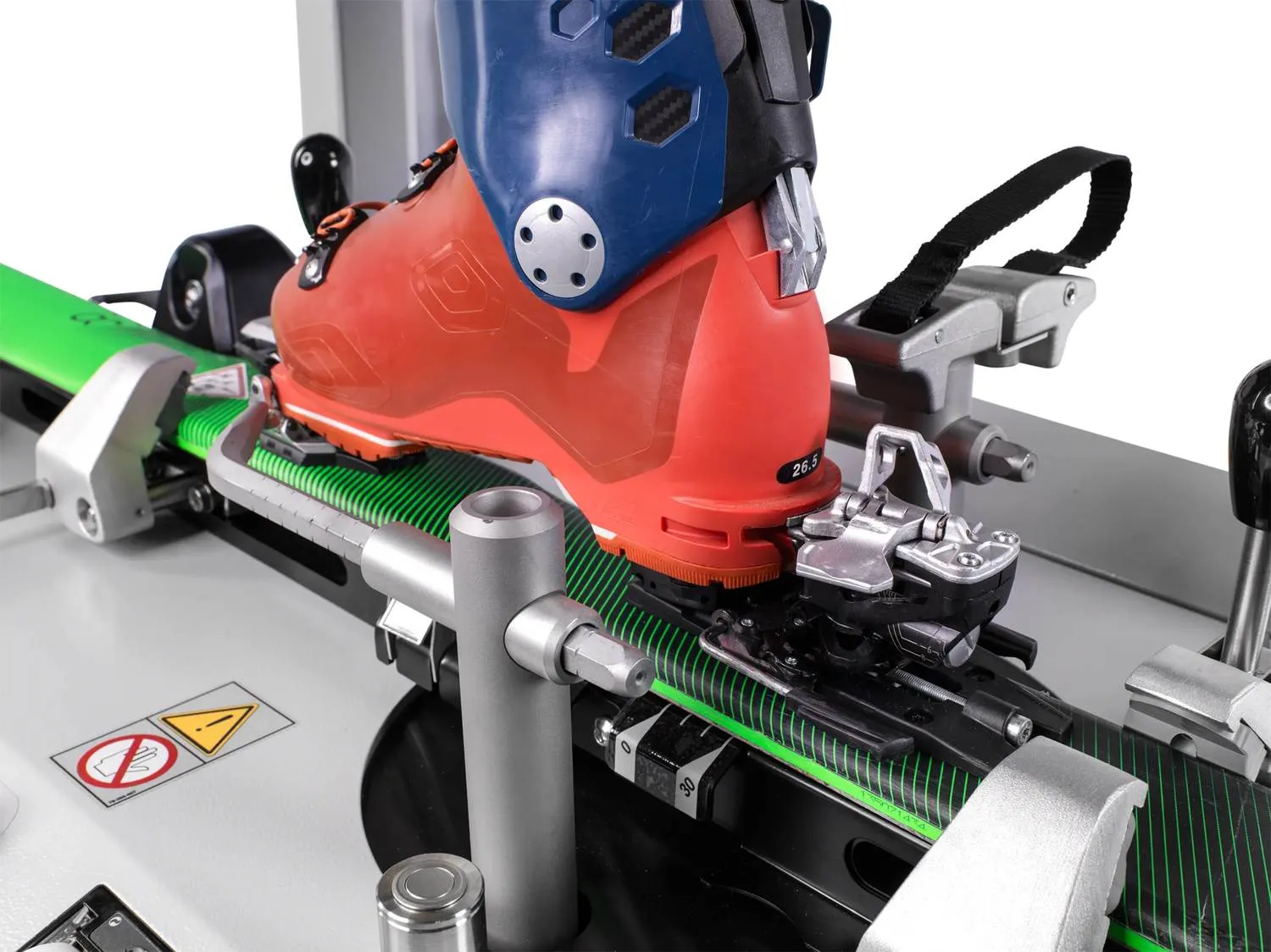 Ski boot in touring binding on the adjustment device, sole length 26.5 visible