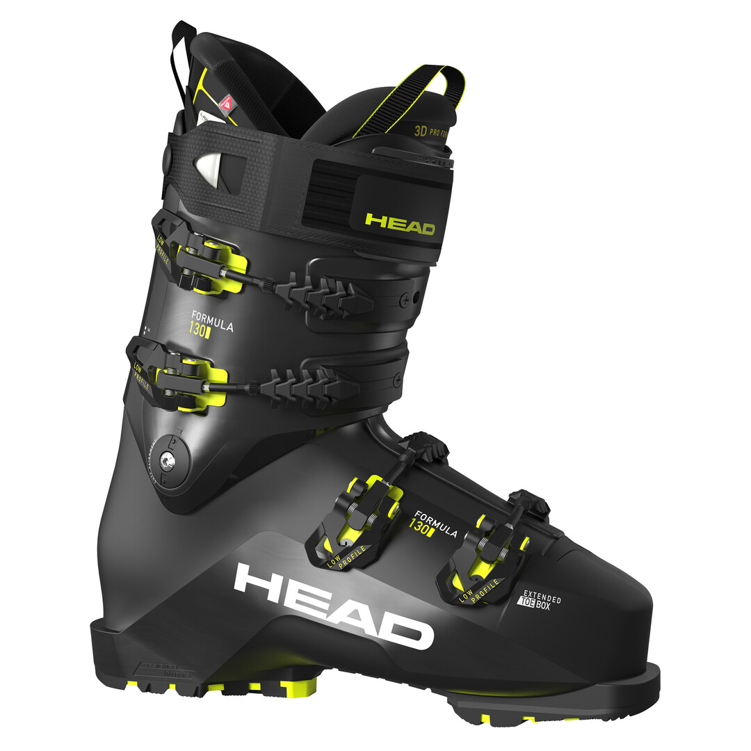 Chaussures de ski noires avec du jaune Chaussure de ski Head Formula 130 GW noire avec des accents jaunes, vue de côté.