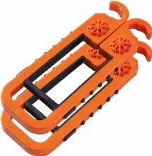Orange-colored Skibat ski carrier with snowflake pattern, two plastic hangers with black elastomer coating.