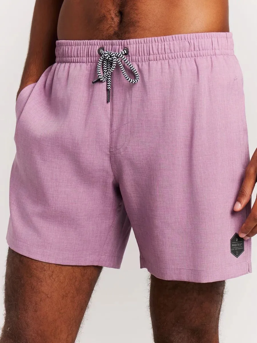 Close-up: person wearing the Protest Daviey beach shorts in Plum Mauve. Detail view of waistband and leg.