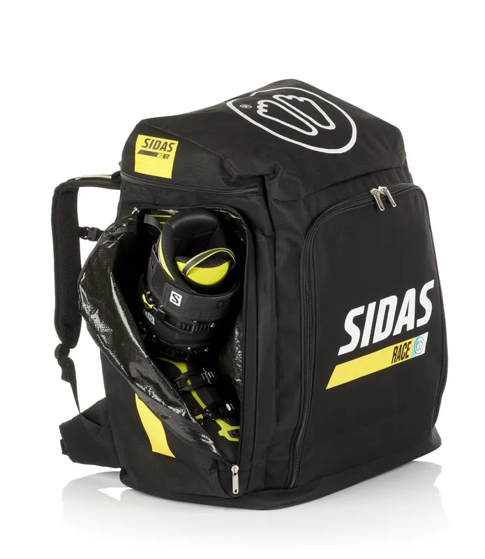 Schwarze Sidas Race Boot Bag mit Skischuh im geöffneten Fach, Logos und gelben Akzenten.