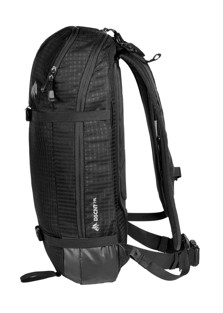 Black Jones DSCNT 19L Backpack, side view, details of straps and zippers visible.