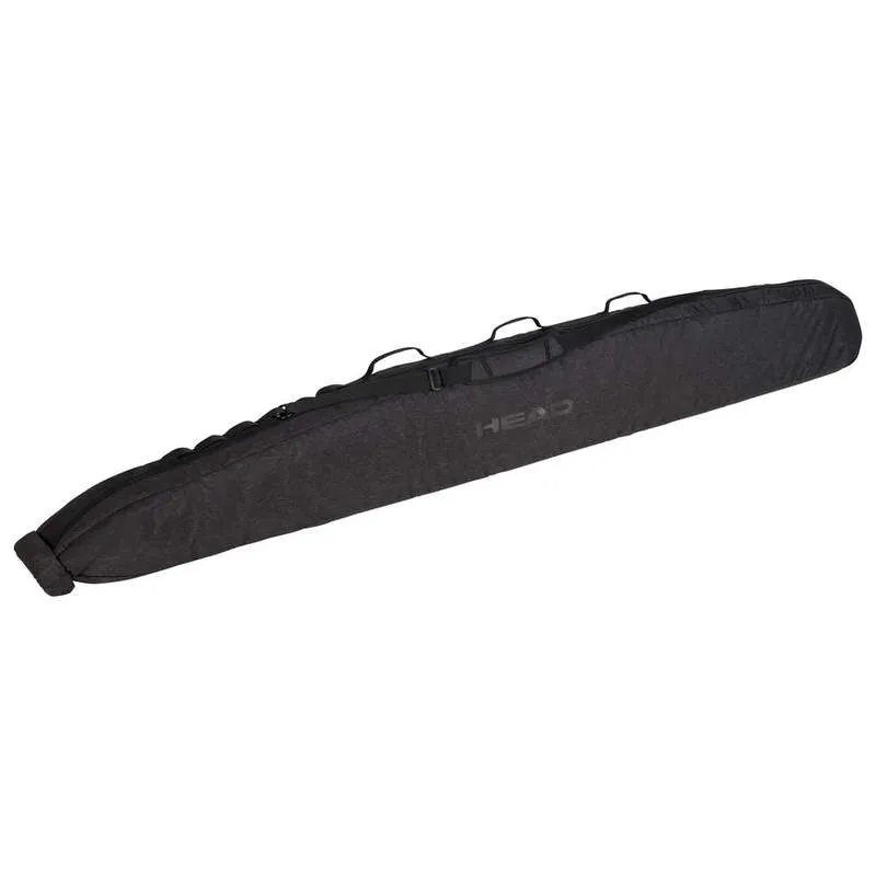 Schwarze Head Kore Single Skibag mit Tragegriffen und Schultergurt liegt diagonal.