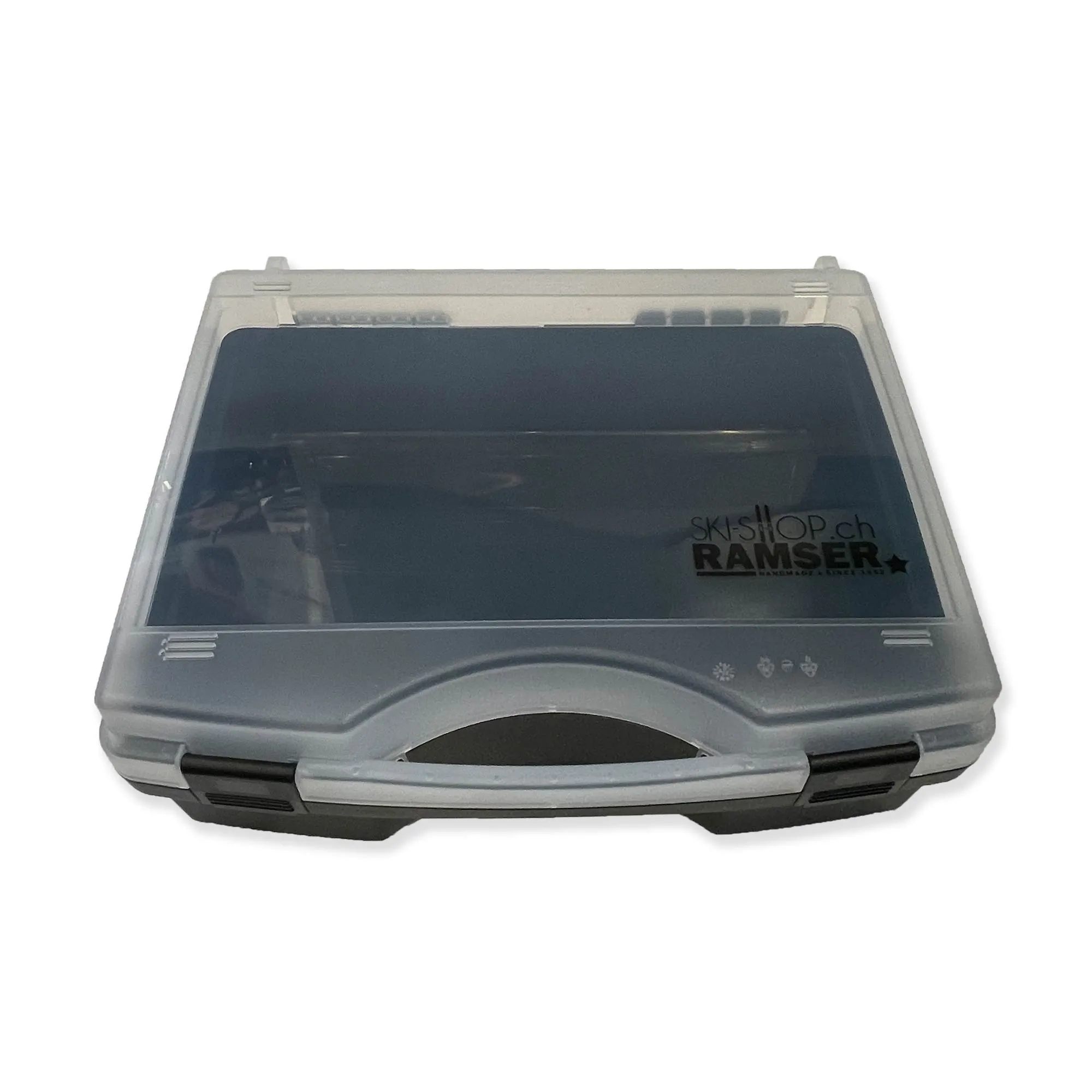 A gray, sealed plastic box for ski wax accessories, with carrying handle and transparent lid with company logo.