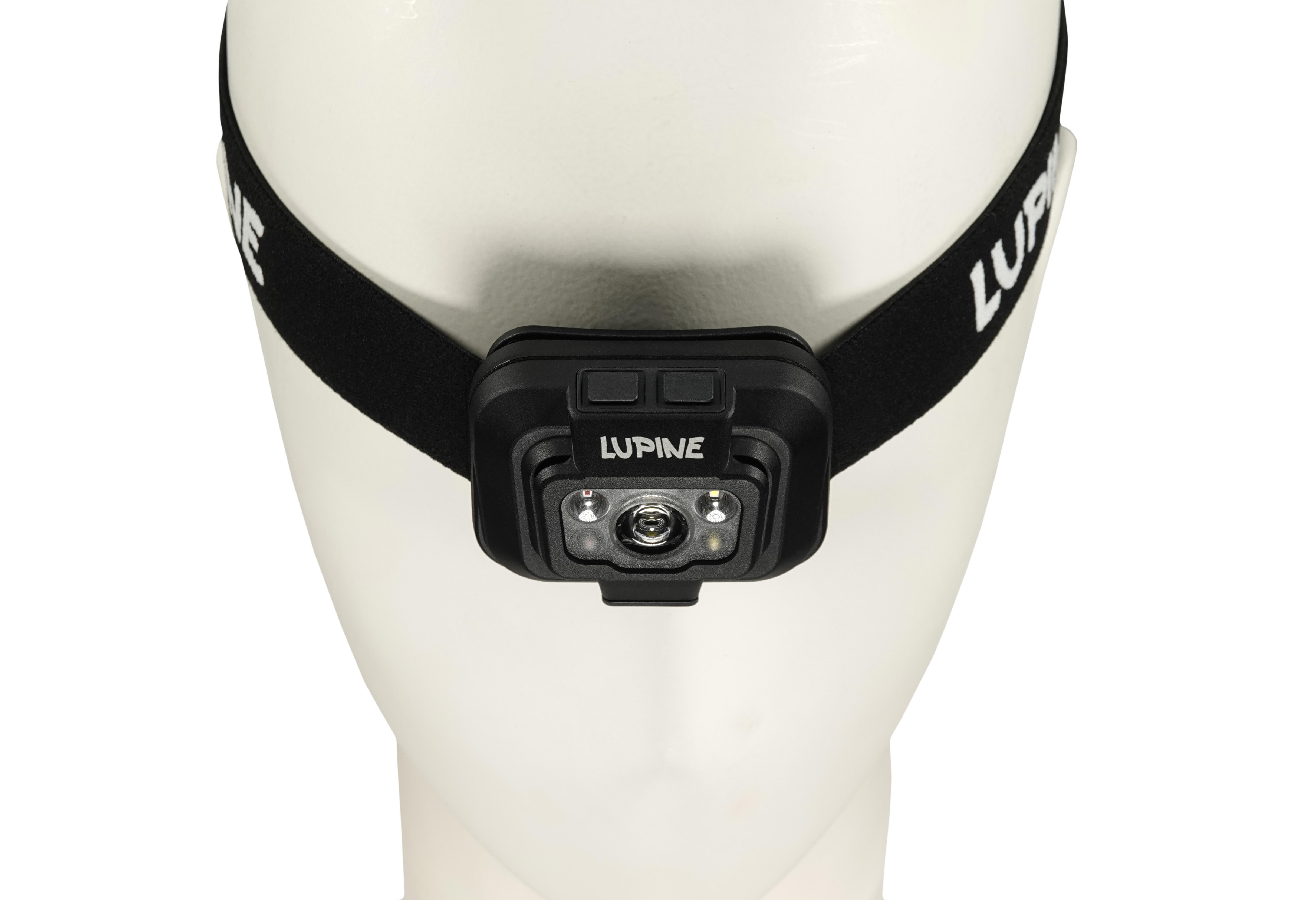 Nahaufnahme der Penta Stirnlampe auf einem weißen Kopf, mit schwarzem Stirnband und "Lupine" Schriftzug.