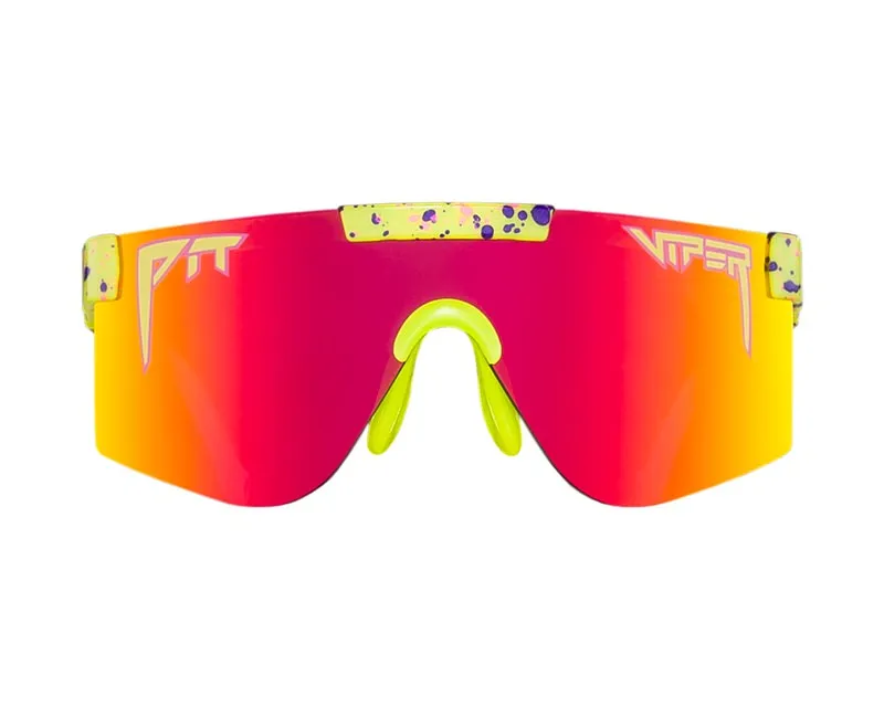 Occhiali da sole colorati "The 1993 XS" con montatura gialla e sfumatura di colore dal rosso al giallo nelle lenti.