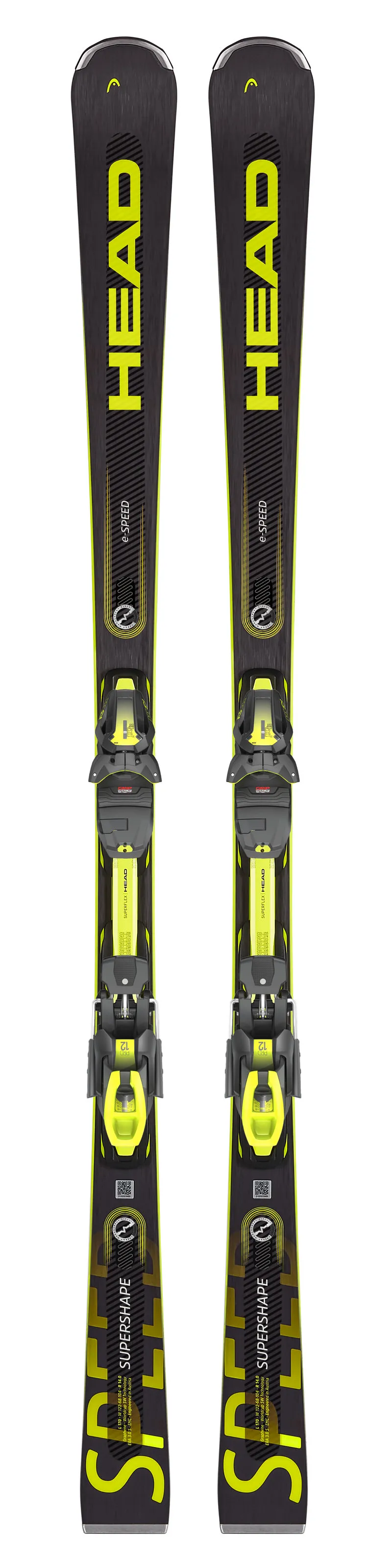 Deux Head Supershape e-Speed Ski, de face, avec inscription jaune sur fond foncé. Les fixations sont montées.