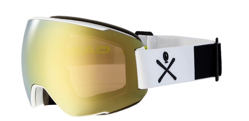 Head Magnify 5K Skibrille mit Gold/WCR Ersatzscheibe, Seitenansicht. Weißes Band mit Totenkopf-Symbol.