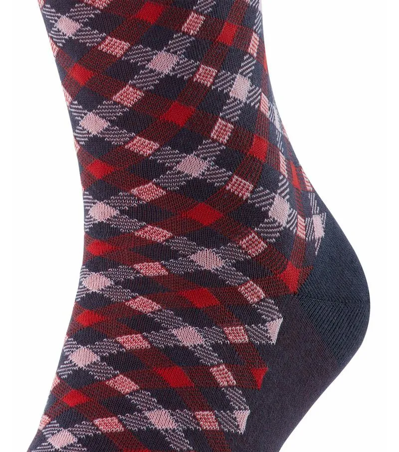 Close-up of a Falke men's sock with Vichy check in red, white and midnight blue.