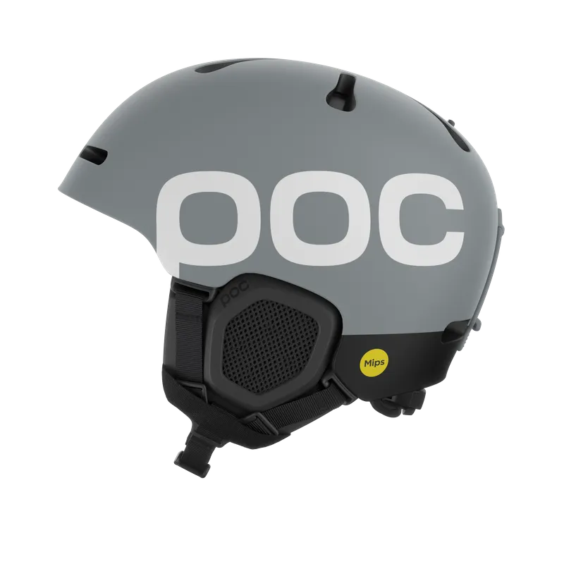 Gray POC ski helmet, side view, with white POC logo, ear protection and Mips sticker.