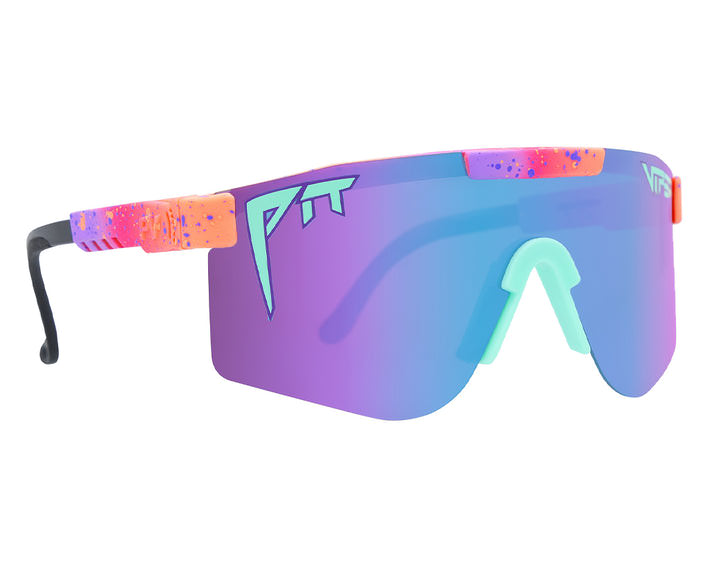 Copacabana Double Wide Sonnenbrille mit polarisierenden, farbigen Gläsern und buntem Rahmen im Farbklecks-Design.