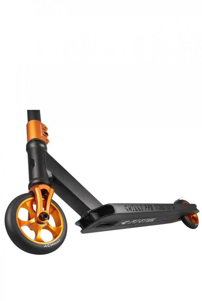 Close-up: Chilli Pro Scooter Reaper Reloaded in Pistol Gold with orange wheels and black deck.