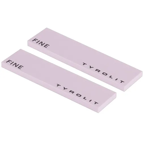 Two elongated, light purple ceramic files lie parallel on a white background. Each is labeled “FINE” and “Tyrolit” in black lettering. For smoothing and polishing ski and snowboard edges for a precise finish.