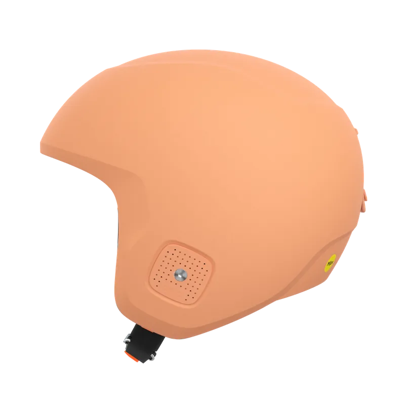 Peach-colored ski helmet in shell construction with ventilation openings and chin strap.