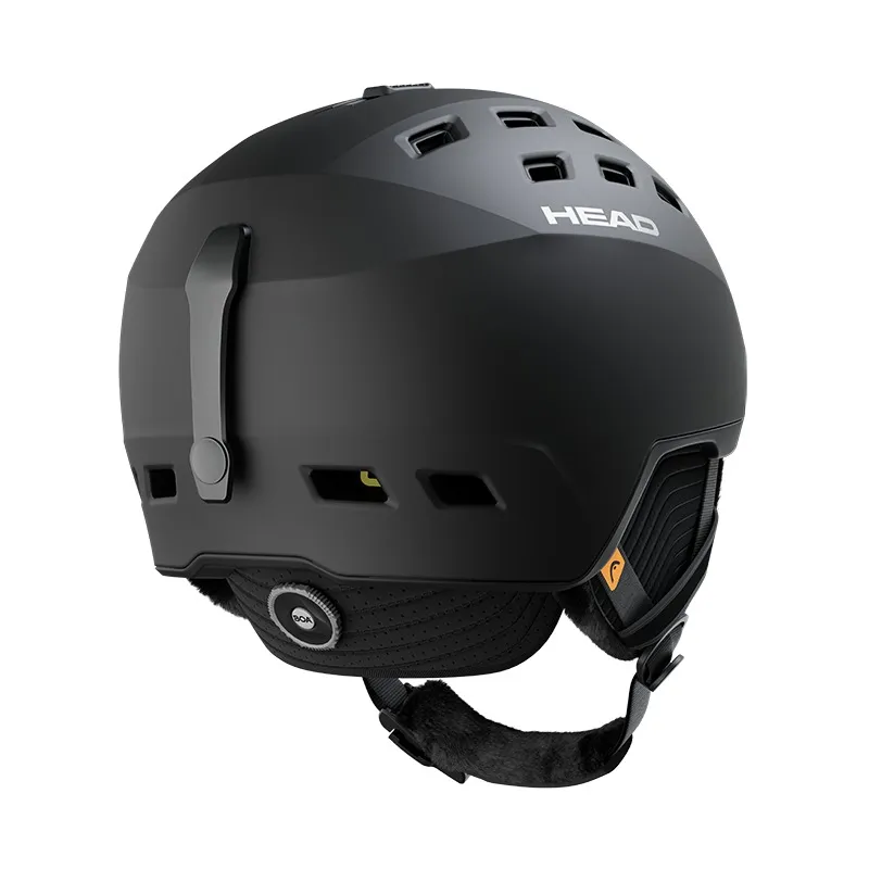 Black Head REV Mips ski helmet from behind, with earmuffs and adjustment wheel.