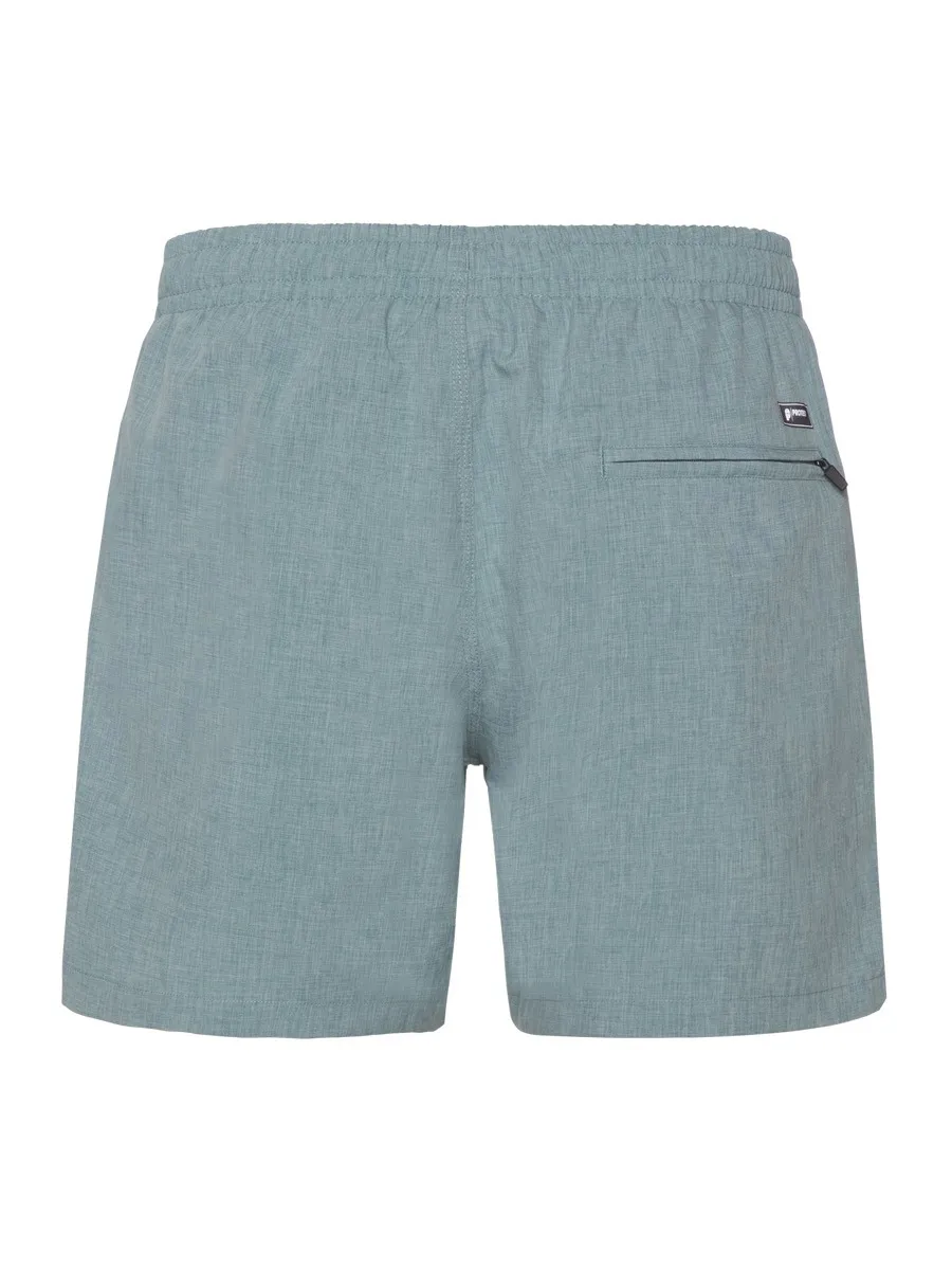 Pantaloncini blu chiaro con elastico in vita sul retro e tasca con zip sulla destra.