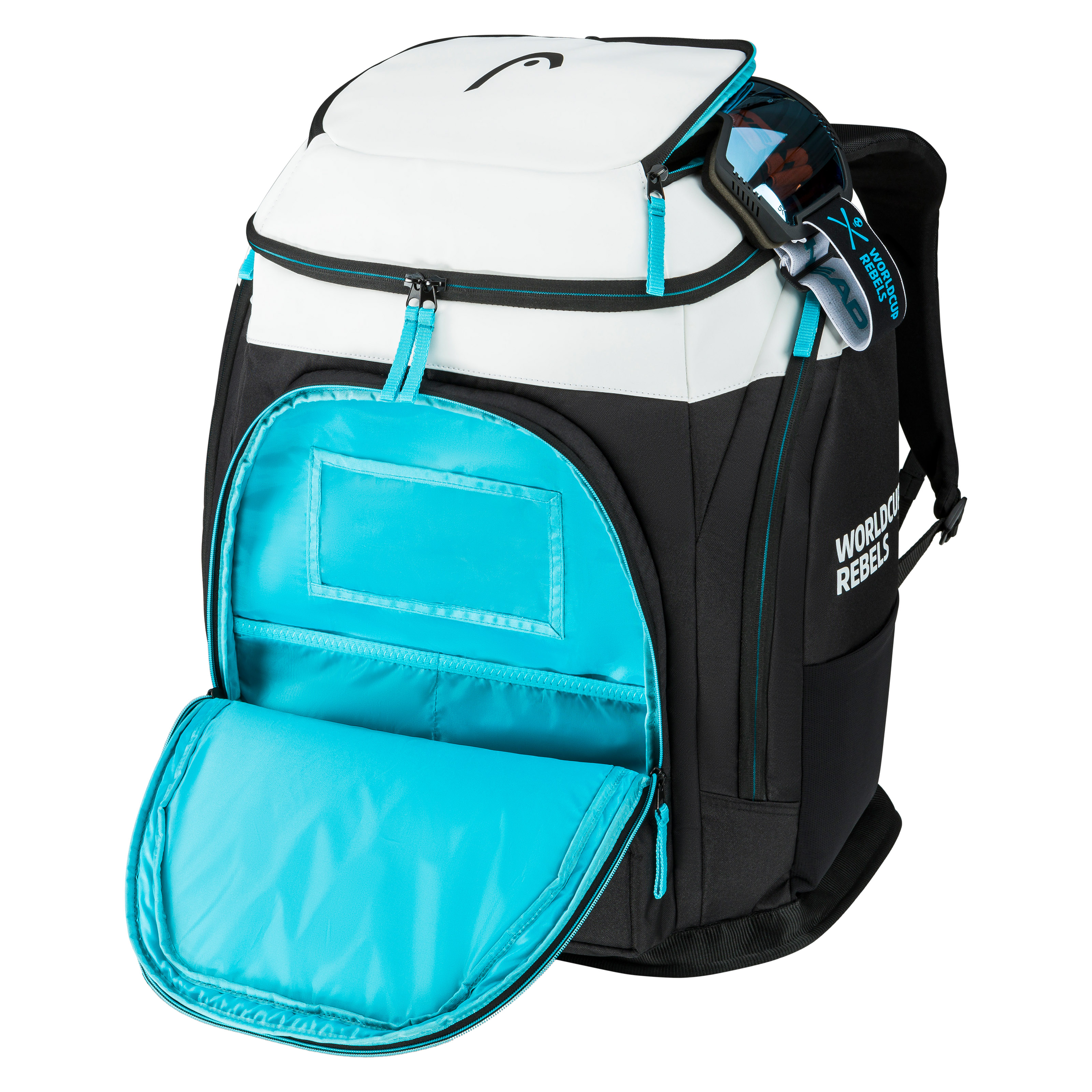 Head Rebels Racing Backpack S, teils geöffnet mit blauem Innenfutter, Skibrille hängt seitlich.