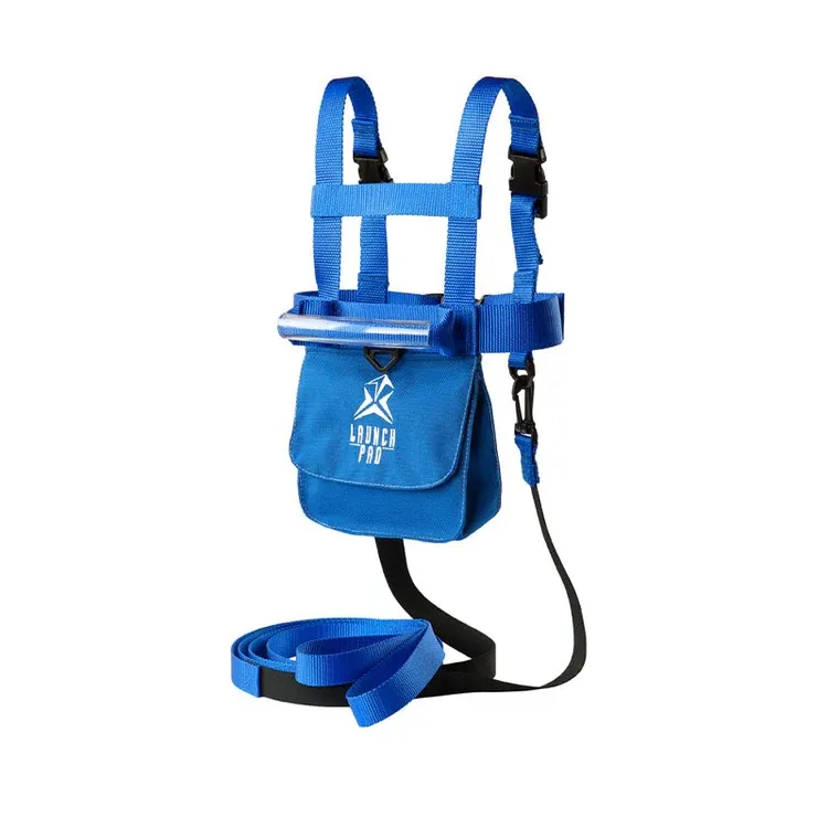 Blue ski harness for toddlers with shoulder straps, a chest strap with a transparent support bar, and a small front pocket featuring the “LAUNCH PRO” logo. Black leash attached to the back, partly coiled and partly flat, for control while skiing.