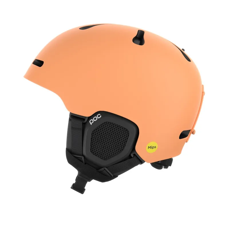 POC Marker ski helmet in peach color, side view with black details and ear protection, isolated against a white background.