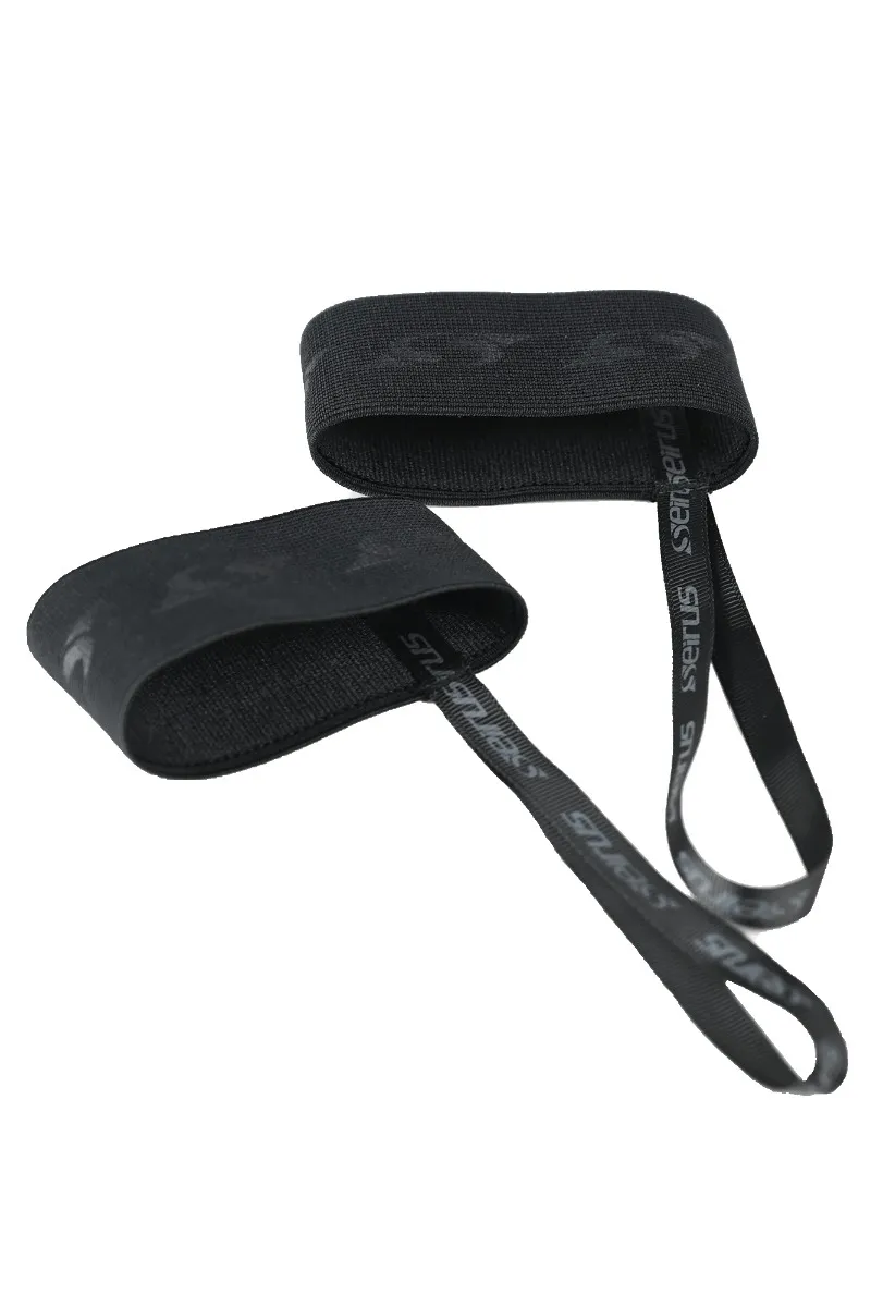 Two black Comfort Leash glove leashes, consisting of an elastic band with logo and loop, insulated on white.