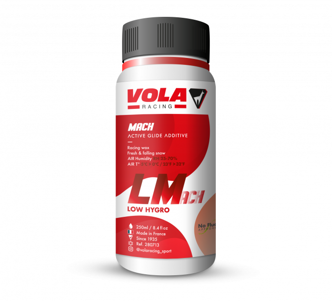 Flasche Vola LMach Rouge Flüssigwachs mit roter Aufschrift und schwarzem Deckel.
