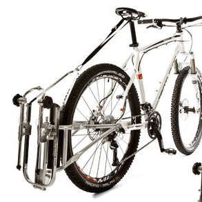 Fahrrad mit montierter FollowMe Tandemkupplung und befestigtem Kinderrad. Detailaufnahme der Kupplung am Fahrrad.