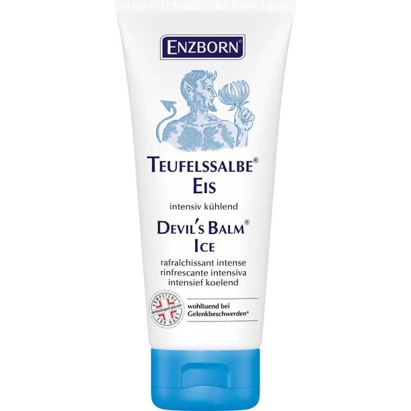 Weiße Tube "Teufelssalbe Eis" mit blauem Deckel und Teufel-Abbildung, die eine Blüte hält. Text in Deutsch, Englisch, Französisch und Niederländisch.
