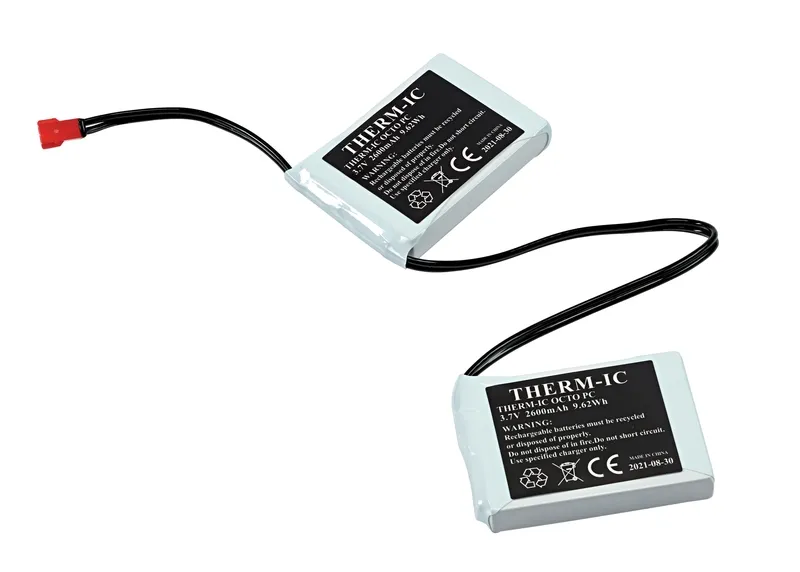 Two Therm-ic Ultra Heat Booster batteries with cable, white housing, black lettering.