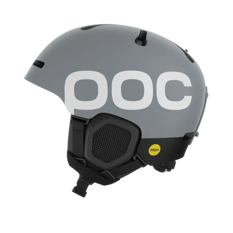 Gray POC ski helmet, side view, with white POC logo, ear protection and Mips sticker.