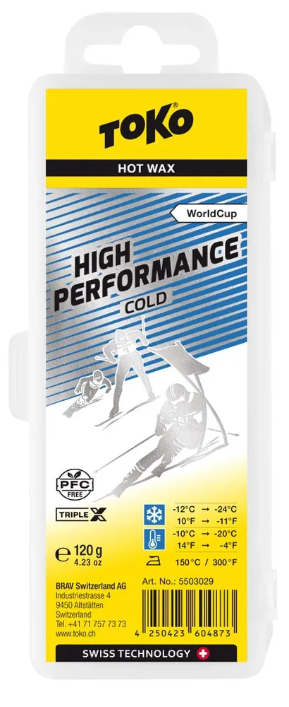Packaging Toko High Performance Triple X Cold Wax, yellow-silver with skier illustrations and temperature information.