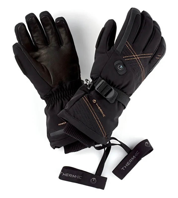 Zwei schwarze Therm-ic Ultra Heat Gloves Women, einer mit Lederinnenfläche, der andere mit Riemen.