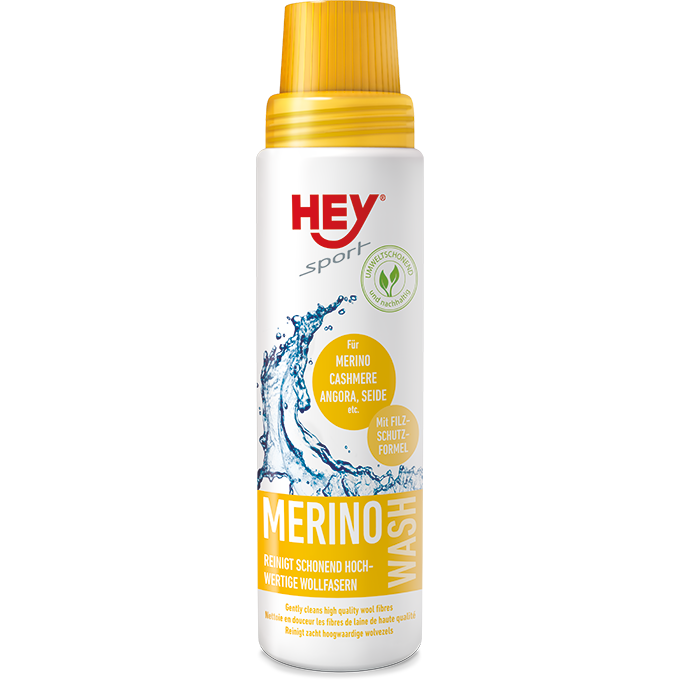 Weiße Flasche Hey Sport Merino Wash mit gelbem Deckel und Text für feine Wollfasern.