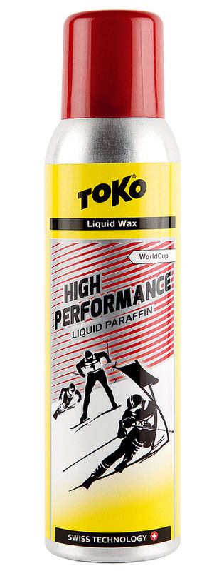 Gelbe Dose Toko High Performance Liquid Paraffin Red mit Skifahrer-Illustrationen. Roter Deckel.