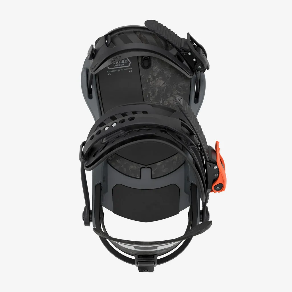 A snowboard binding in black and gray with an orange detail. View from above, centered against a white background.