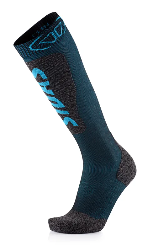 A long, dark blue sock with gray reinforcements on the heel, toes and shin. There is light blue lettering on the shin and a pattern on the top.