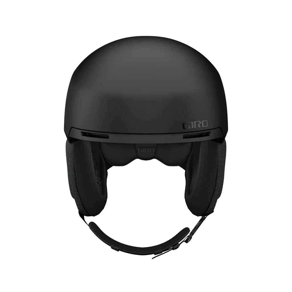 Black Giro Tagert MIPS ski helmet from the front, with ear pads and chin strap.