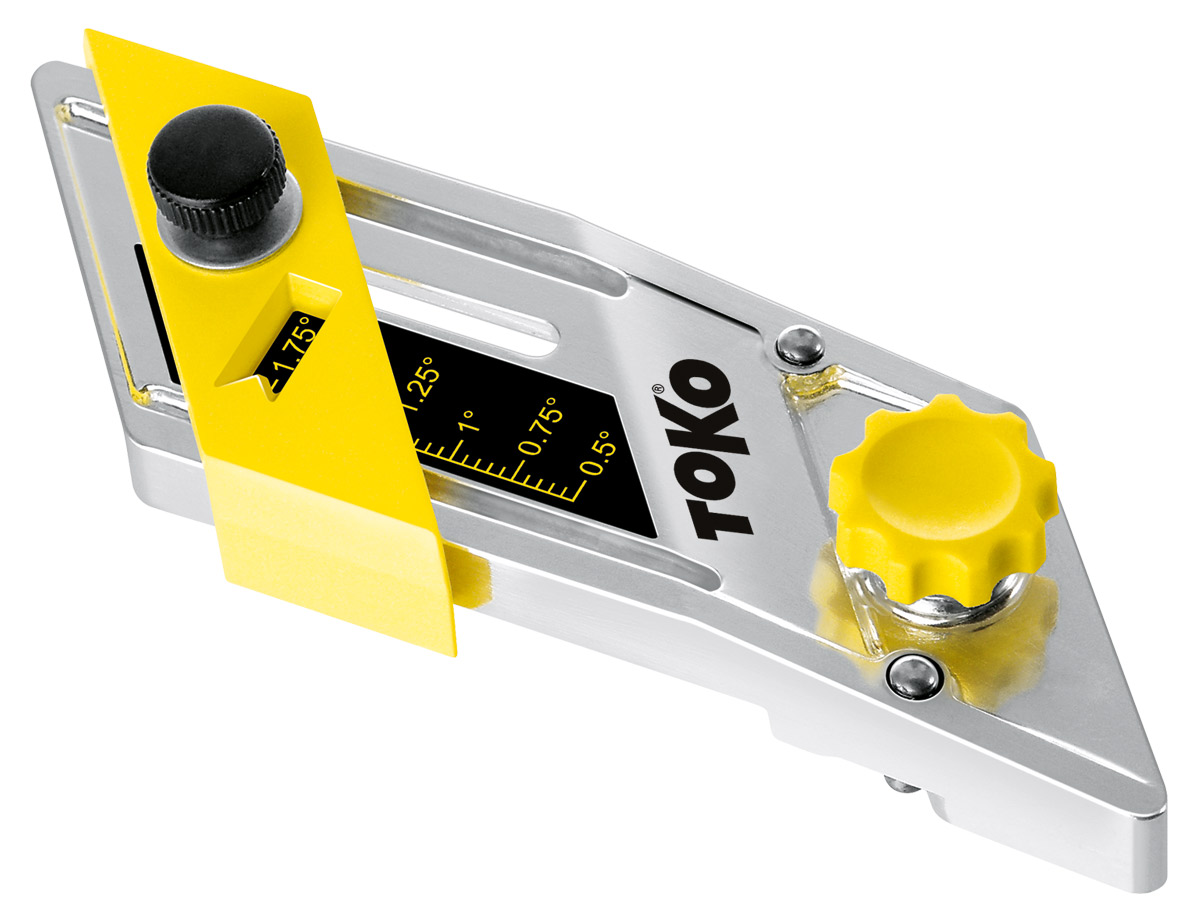 Toko Multi Base Angle Toko Multi Base Angle pour ski/snowboard : outil argenté avec des éléments jaunes pour le traitement des carres de la semelle.