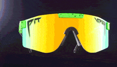Occhiali da sole polarizzati "Boomslang Double Wide" verde neon con lenti gialle.