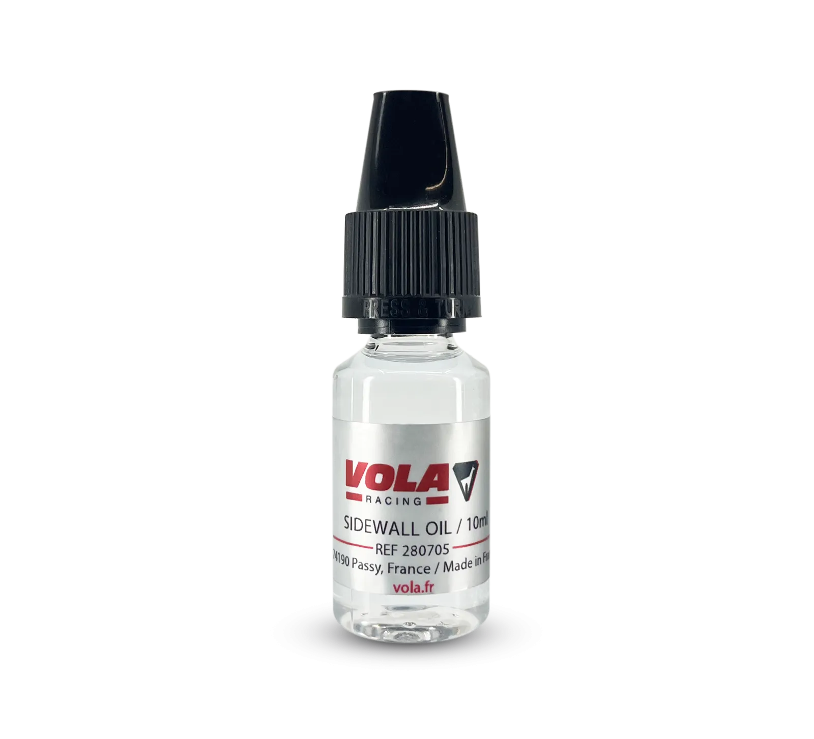 Small, transparent oil bottle with black dispensing tip and VOLA Racing label. The label is silver with red accents.