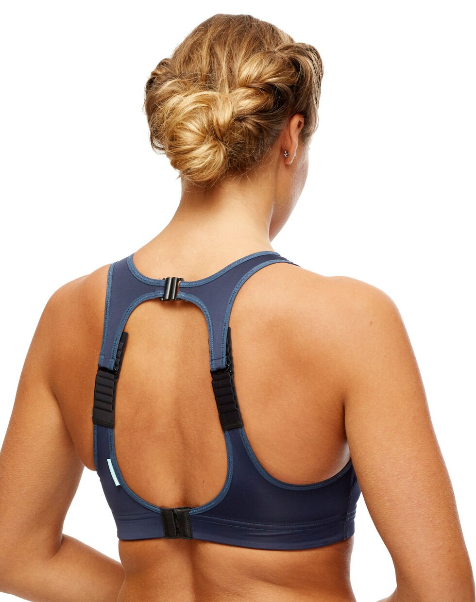 Rückenansicht eines Driva Sports Bra Wool Mix mit verstellbaren Trägern und Hakenverschluss.