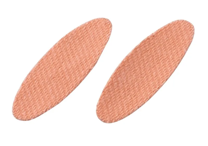 Two skin-colored, elongated Sidas toe protectors, lying diagonally on a white background.