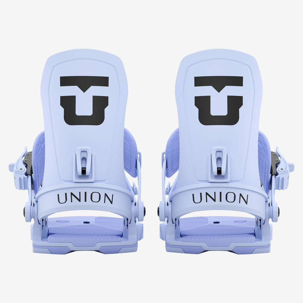 Fixations de snowboard bleu clair Deux fixations de snowboard bleu clair Union, alignées de face, avec les logos noirs Union sur fond blanc.