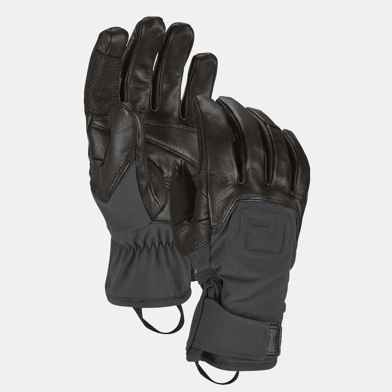 Zwei schwarze Ortovox Alpine Pro Handschuhe liegen übereinander.