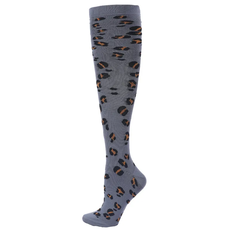 Gray, knee-length Panter ski sock with black and brown leopard pattern.
