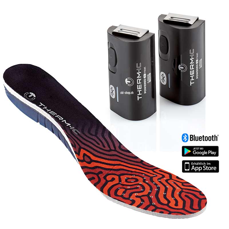 Therm-ic Insole Heat 3D Sohle mit Akkus. Die Sohle ist schwarz-rot gemustert. Die Akkus sind schwarz und haben einen silbernen Clip.