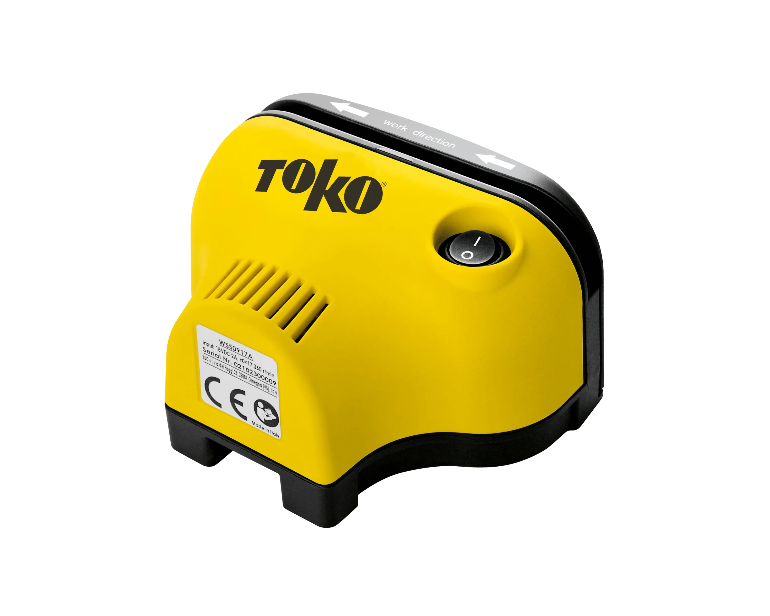 Yellow Toko tool with black edge and lettering. Arrows indicate the working direction. A round power button is visible.